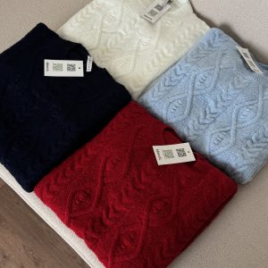 Cable-kknit sweater